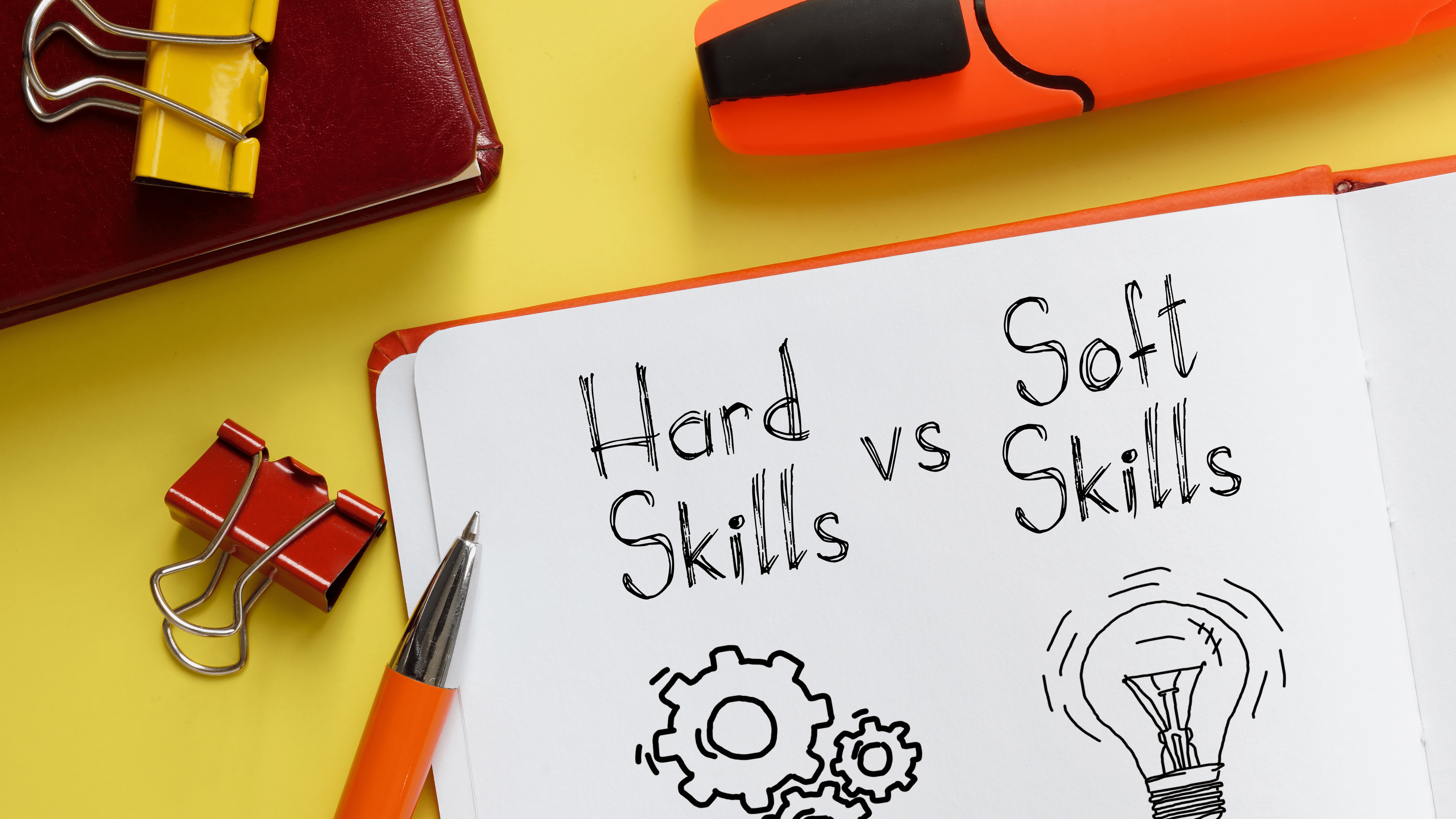 Hard Skills vs Soft skills shown on a business photo using the text